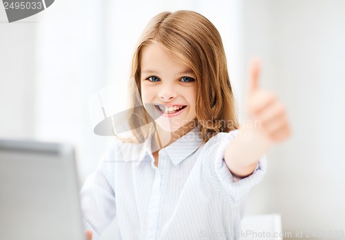 Image of girl with laptop pc at school