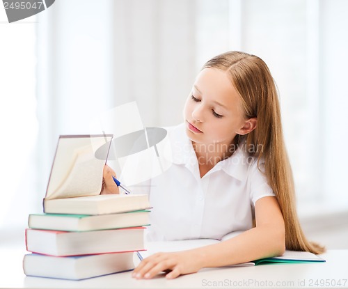 Image of student girl studying at school