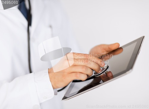 Image of doctor with stethoscope and tablet pc