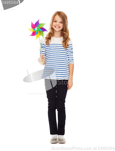 Image of child with colorful windmill toy