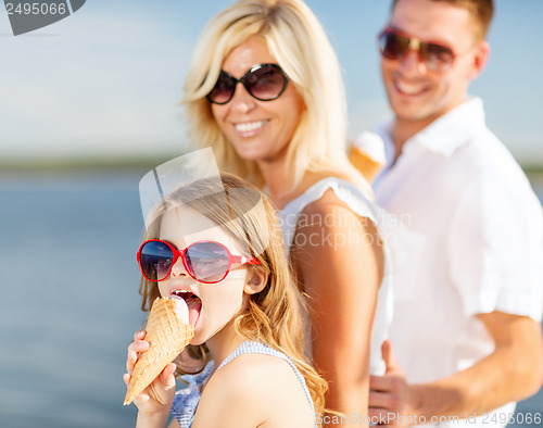 Image of happy family eating ice cream