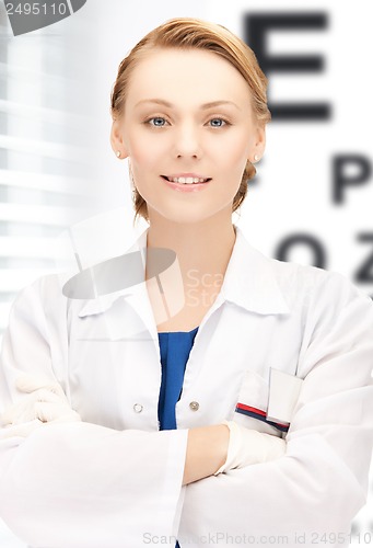 Image of female ophthalmologist with eye chart