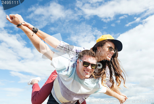 Image of teenagers having fun outside