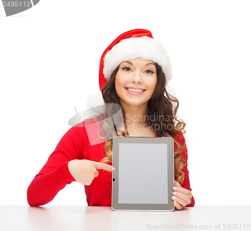 Image of woman in santa helper hat with tablet pc