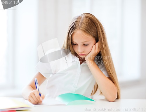 Image of student girl studying at school