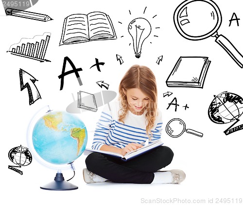 Image of girl with globe and book