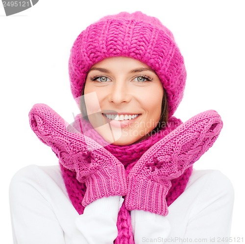 Image of woman in hat, muffler and mittens