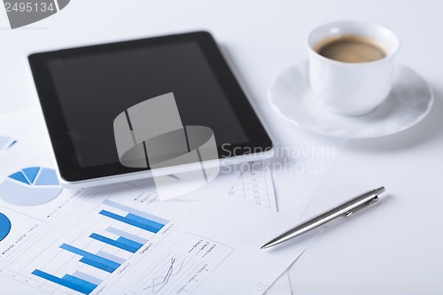 Image of tablet pc with cup of coffee