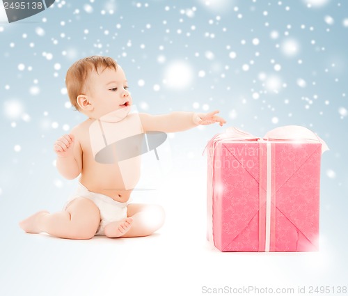 Image of happy child with gift box