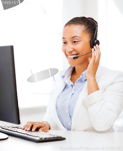 Image of african female helpline operator