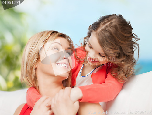 Image of happy mother and daughter