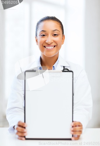 Image of doctor with blank prescription