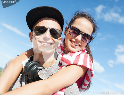 Image of teenagers having fun outside