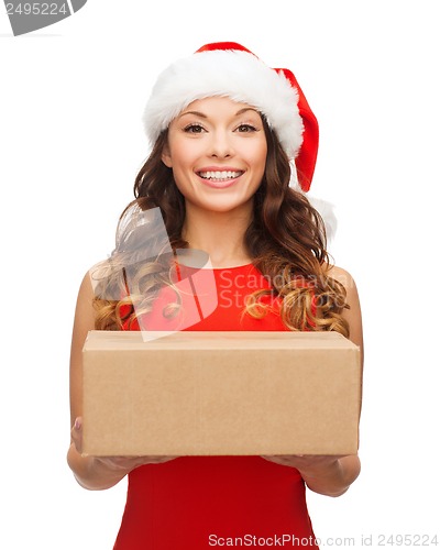 Image of smiling woman in santa helper hat with parcel box