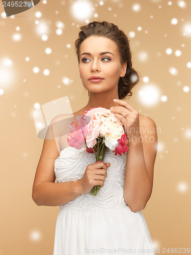 Image of woman with bouquet of flowers