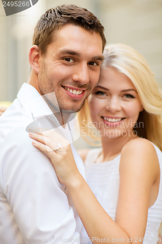 Image of young married couple in the city
