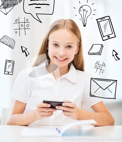 Image of girl with smartphone at school