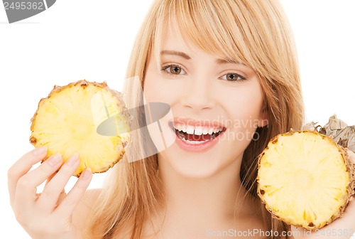 Image of happy girl with pineapple