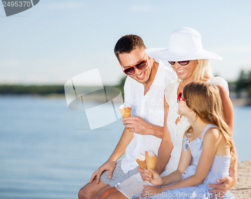 Image of happy family eating ice cream