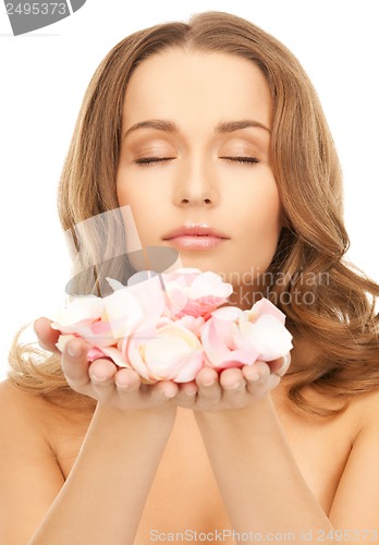 Image of woman with rose petals