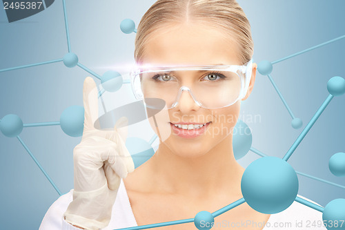 Image of woman in protective glasses and gloves