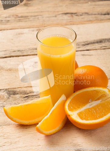 Image of orange juice with oranges