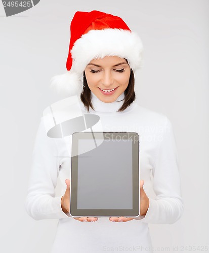 Image of woman in santa helper hat with tablet pc