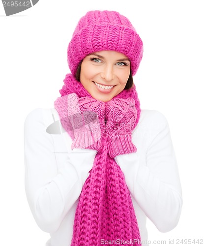 Image of woman in hat, muffler and mittens