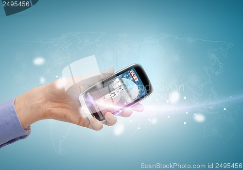 Image of hand showing smartphone with news app