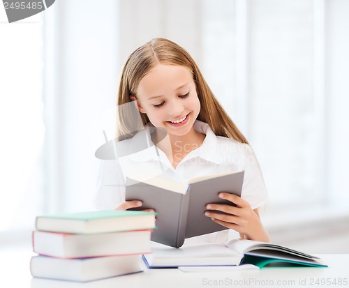 Image of student girl studying at school