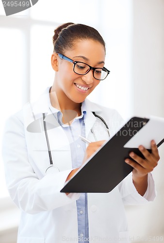 Image of african female doctor in hospital