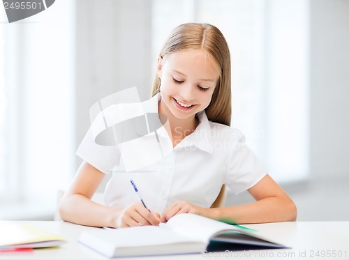Image of student girl studying at school