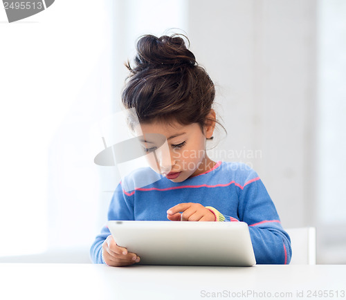 Image of girl with tablet pc at home