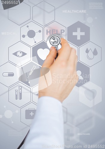 Image of doctor with stethoscope and virtual screen