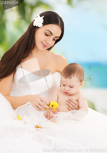 Image of happy mother with adorable baby