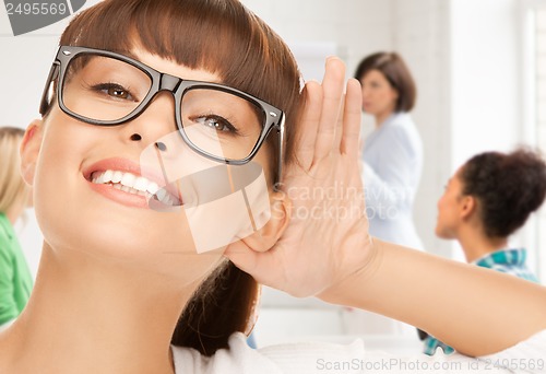 Image of happy woman listening gossip