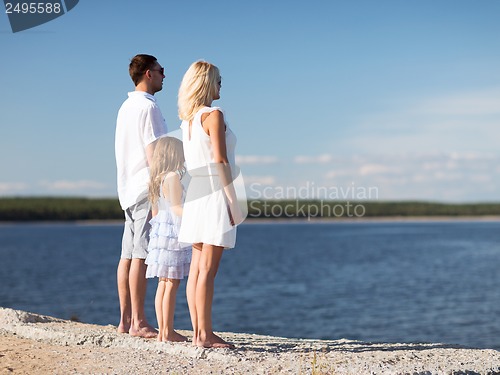 Image of happy family at the seaside