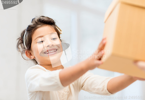 Image of happy child girl with gift box