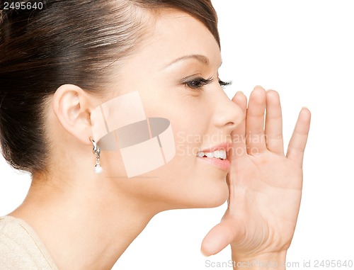 Image of woman whispering gossip