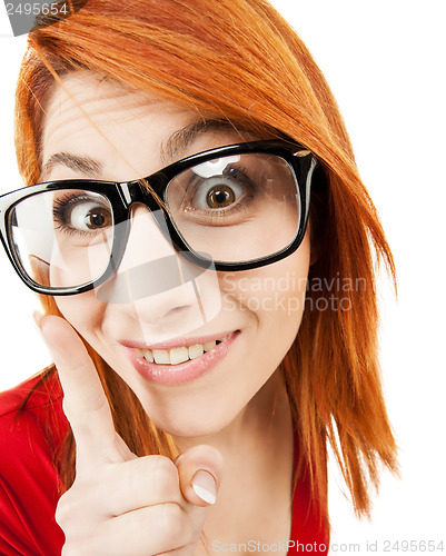 Image of woman in glasses with finger up