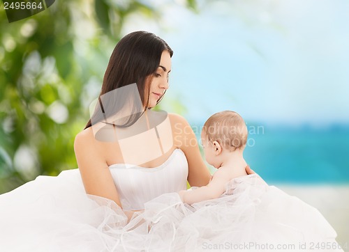 Image of happy mother with adorable baby