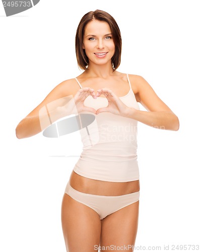 Image of woman forming heart shape