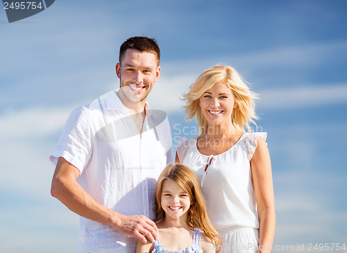 Image of happy family with blue sky