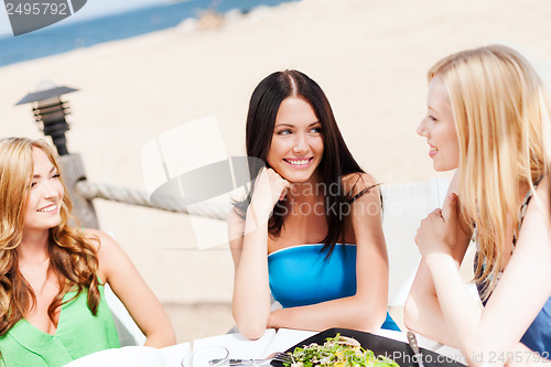 Image of girls in cafe on the beach