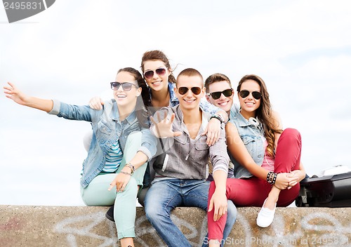 Image of group of teenagers hanging out