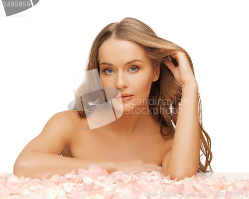 Image of woman with rose petals