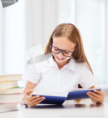 Image of student girl studying at school