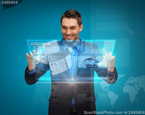 Image of businessman with virtual screen