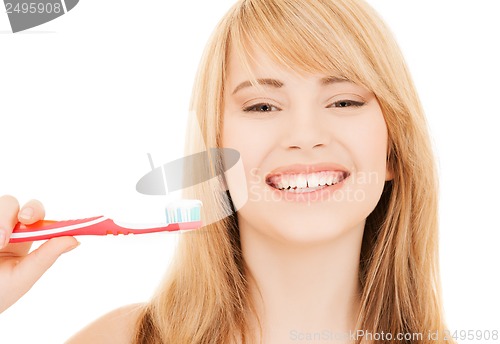 Image of teenage girl with toothbrush