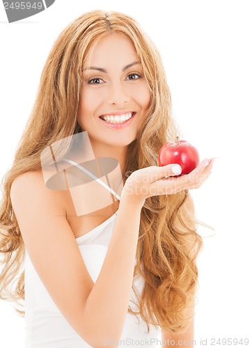 Image of smiling woman with red apple